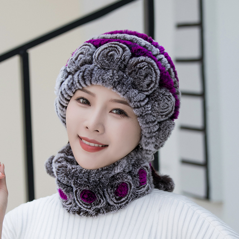 "Fluffig dam fuskpälsmössa i olika färger för varm vinterkomfort och stil, women's accessories."