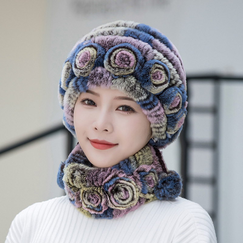 "Fluffig dam fuskpälsmössa i olika färger för varm vinterkomfort och stil, women's accessories."