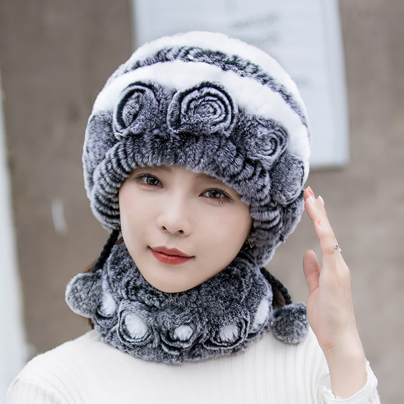 "Fluffig dam fuskpälsmössa i olika färger för varm vinterkomfort och stil, women's accessories."