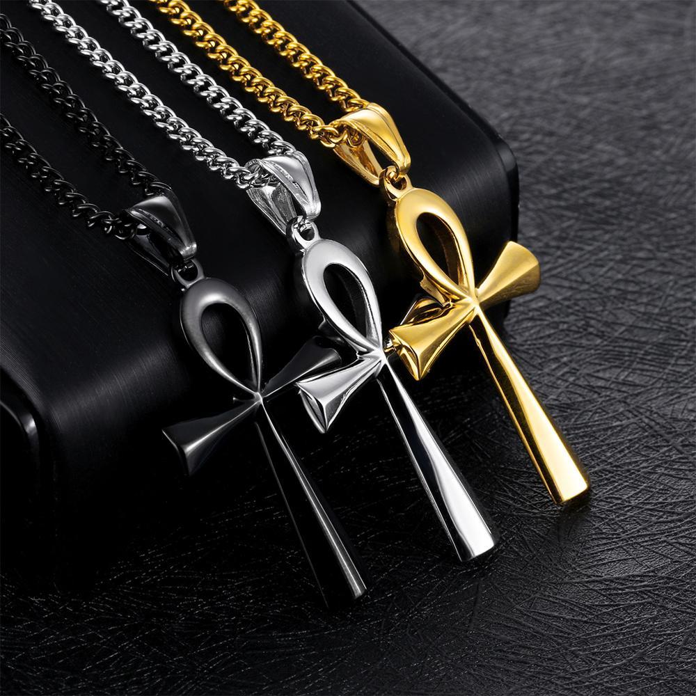 "Forntida egyptiskt kors halsband i rostfritt stål, silverfärgat, med detaljerad korsdesign och justerbar kedja."