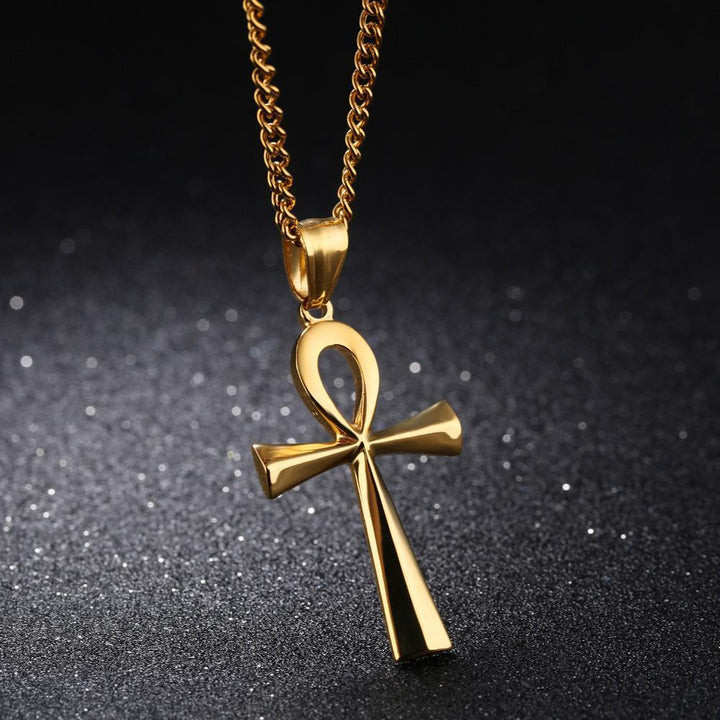 "Forntida egyptiskt kors halsband i rostfritt stål, silverfärgat, med detaljerad korsdesign och justerbar kedja."