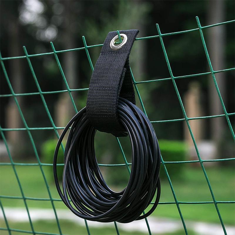 Förvaringsband i nylon med kardborre för effektiv organisering av kablar och slangar, idealisk för garage och verkstad.