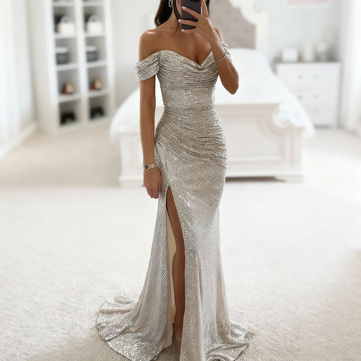 Festlig långklänning för damer, off shoulder med gnistrande paljetter och en stilfull slits.