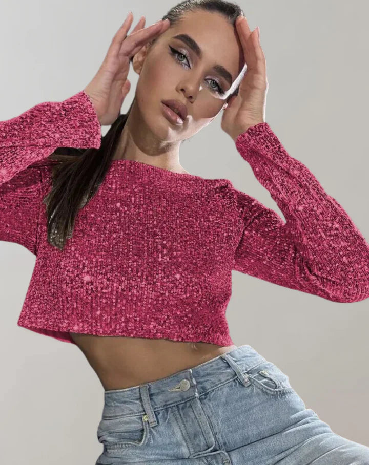 Glamorös damtopp, kort modell i glittrigt tyg, en stilren detalj för modeinriktade kvinnor.