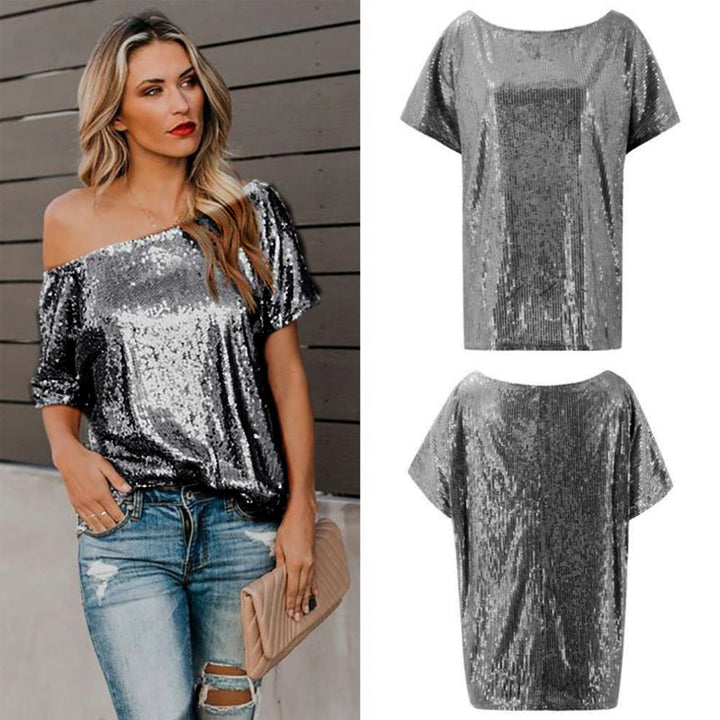 "Glittrig kvinnlig skjorta i polyester och bomull med paljetter för en glamorös look, perfekt för både vardag och fest."