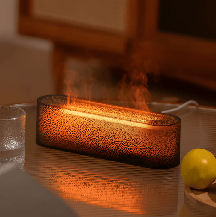 Elegant luftfuktare med stämningsfulla LED-ljus och doftspridare. Förbättrar inomhusklimatet och ger välbefinnande.