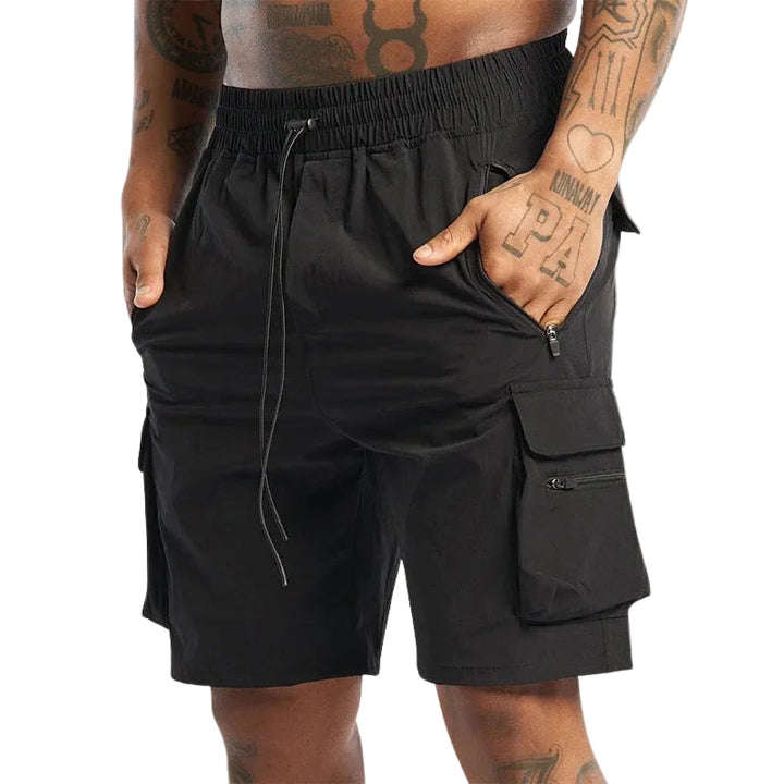 Gul herrshorts med lastfickor, bekväm passform och dragsko, perfekt för sommar och träning.