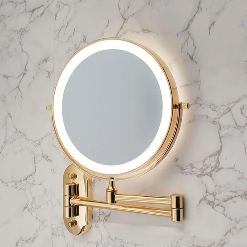 Lyxig guld LED sminkspegel för badrum, uppladdningsbar med stark förstoring. Perfekt för detaljer.