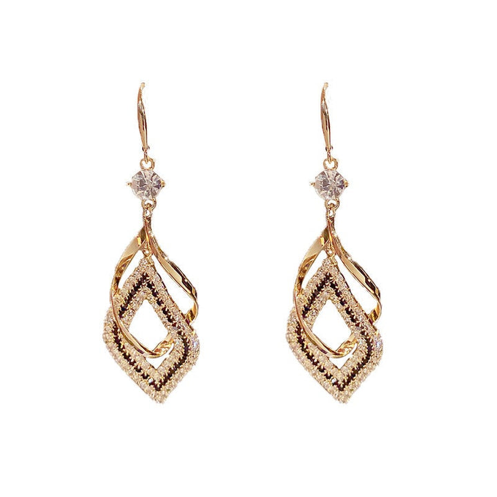 Guld romb örhängen för damer med diamanter, elegant design med glansig finish, perfekt för moderna kvinnor.