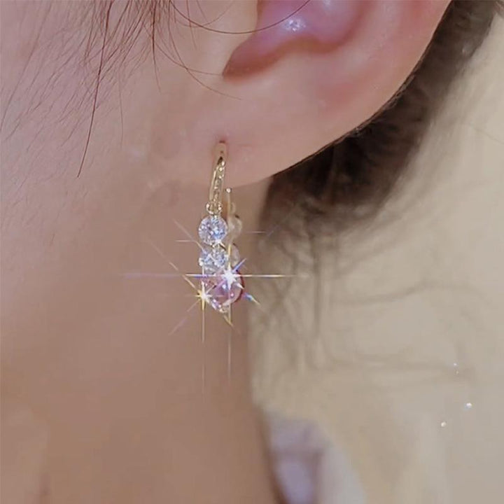 "Gyllene glitter zirkon örhängen för kvinnor, färgglada stenar, gnistrande design, perfekt för elegant stil och charm."