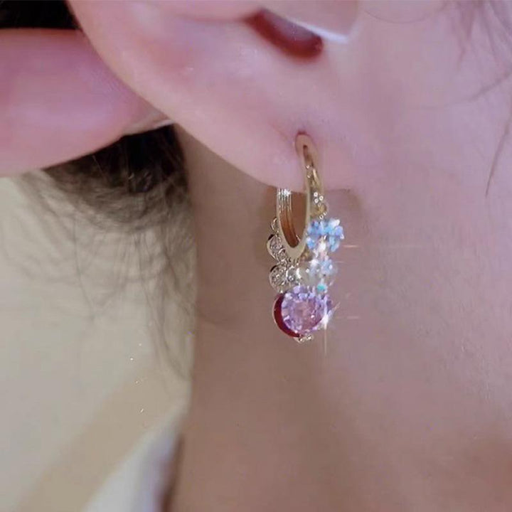 "Gyllene glitter zirkon örhängen för kvinnor, färgglada stenar, gnistrande design, perfekt för elegant stil och charm."