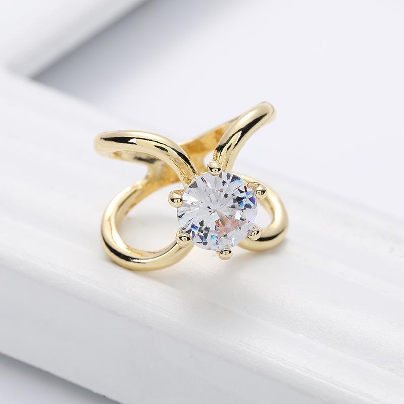 "Gyllene silkespänne med strass och pärlor, elegant accessoar för kvinnor, lyxig legering, sofistikerad stil."