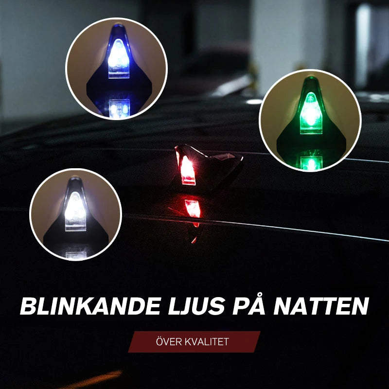 "Hajfena solar varningsljus för bil, LED och solcellsdriven, elegant hajfensdesign, förbättrar stil och säkerhet."