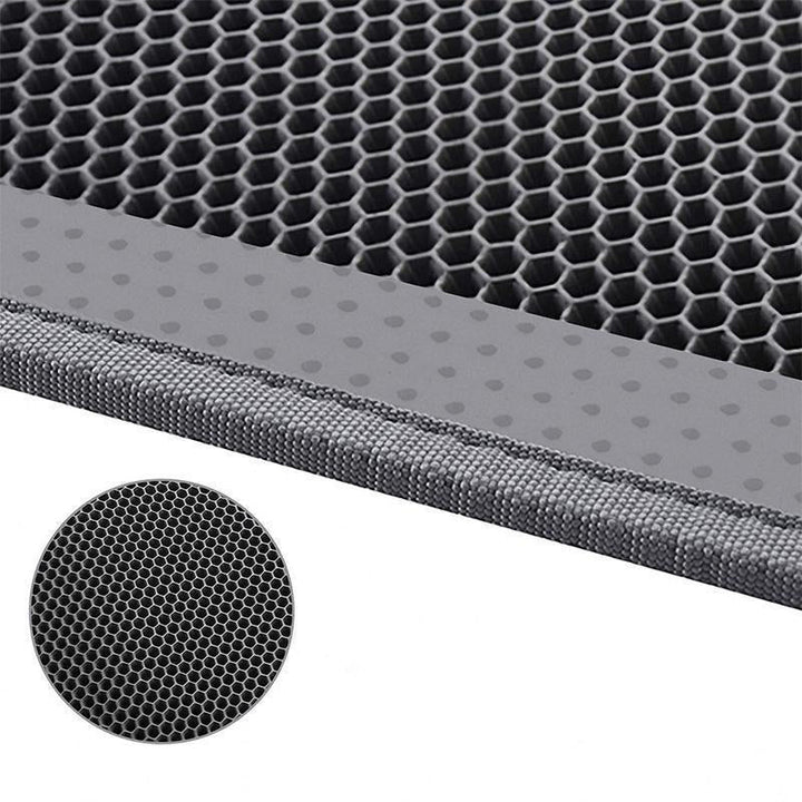 Halkfri kattsandmatta i svart TPE-gummi, fångar upp sand och skyddar golv. Idealisk för rena husdjurshushåll.