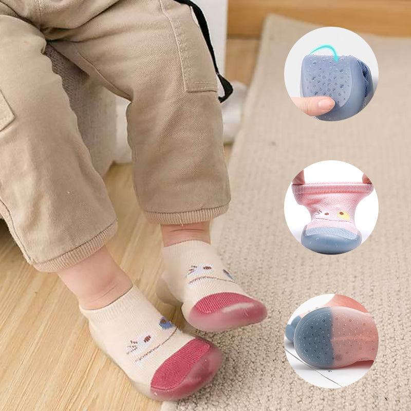 "Halkfria barnstrumpor med djurmotiv, flexibla sulor och elastisk topp, perfekt för små barns naturliga fotutveckling."