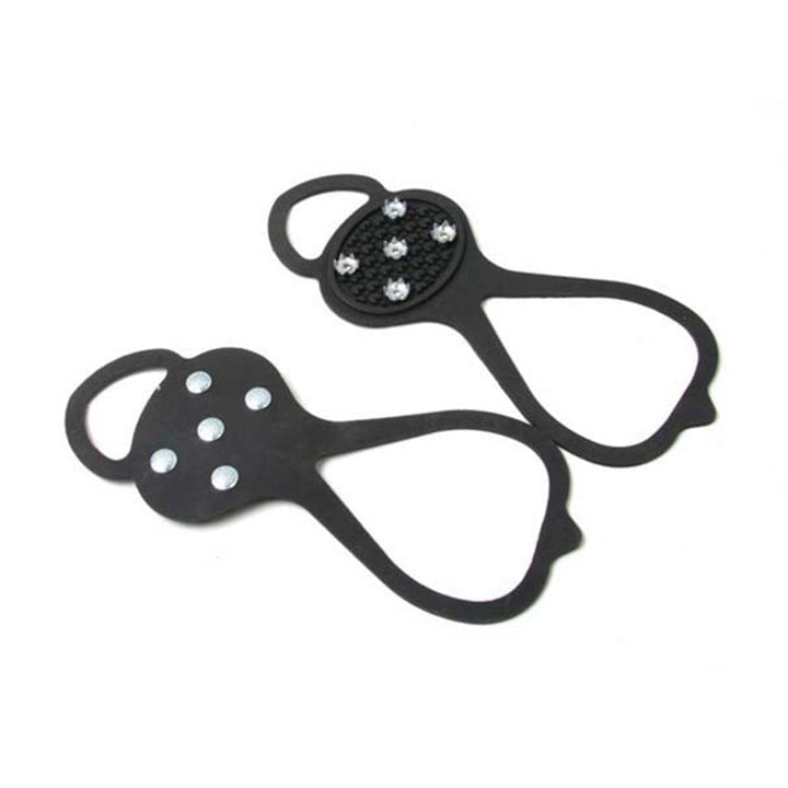 "Halkfria silikon skoskydd, unisex, svart, robusta stålpinnar för isigt underlag, designade för säker vintergång."