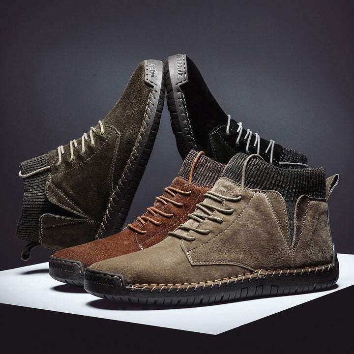 "Hållbara handsydda mid-top sneakers för män i slitstarkt material och urban stil, perfekta för alla tillfällen."