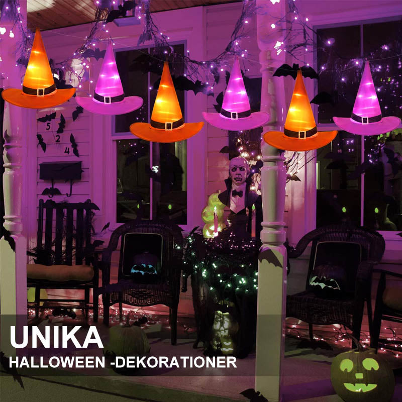 "Halloween häxhatt dekoration med LED-stränglampor i färgglada nyanser för magisk festivalstämning."