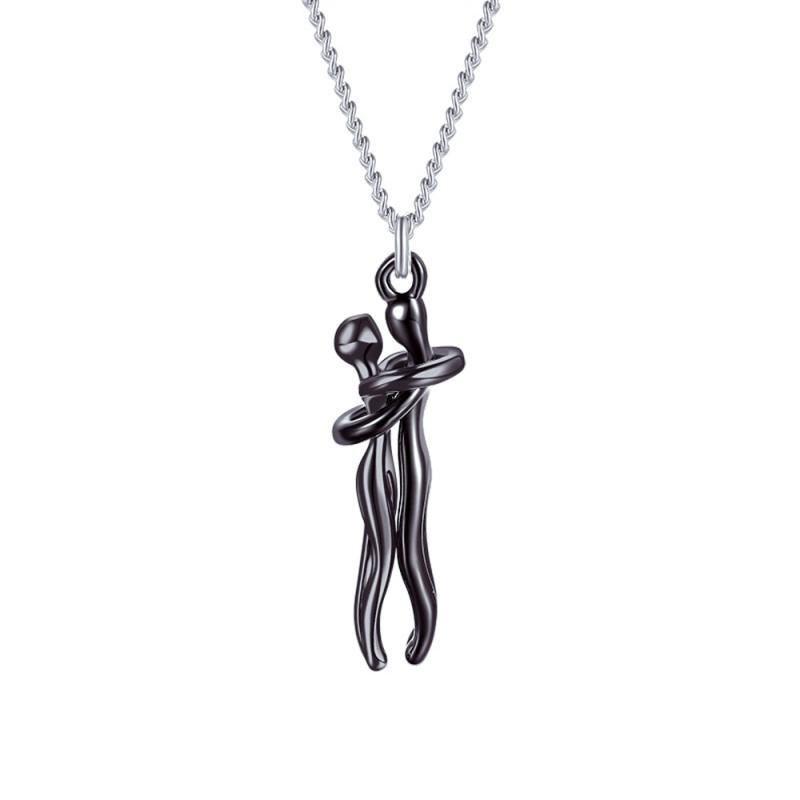 Förpackat halsband med kramande figurer, redo som present - tillverkat i rostfritt stål.