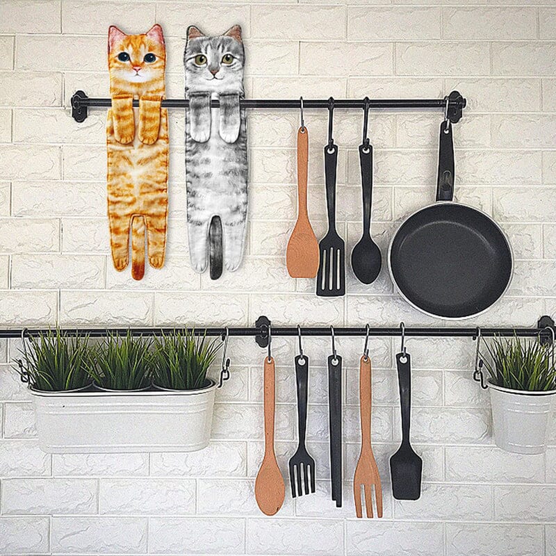 "Handduk med sött och realistiskt kattansikte, perfekt för kattälskare och inredning av kök eller badrum."