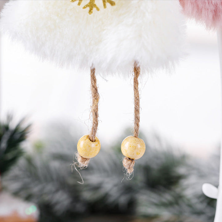 "Handgjord julängel med jute och fjädrar, detaljrik, perfekt prydnad för ditt hem under julen."