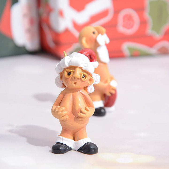 "Handgjord jultomte i harts, färgglad och väderbeständig dekoration för julstämning hemma."