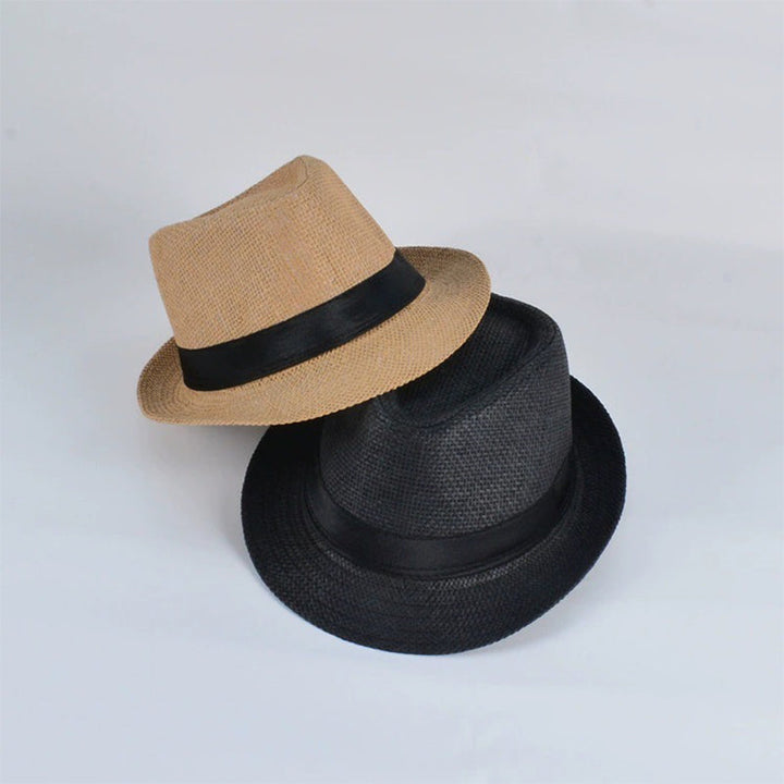 "Handgjord panama solhatt för män i beige, med elegant flätad design och brett brätte för optimalt solskydd på sommaren."