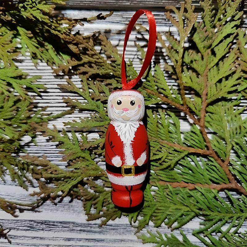 Handgjord tomteleksak i färgglatt trä, perfekt som julprydnad med överraskningseffekt för glädje och skratt.