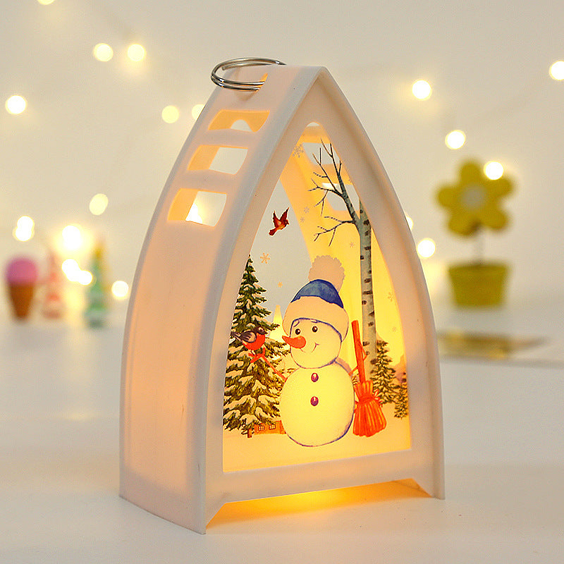 "Handmålat LED juldekorationsljus med snögubbe design för julbord, ger magisk och festlig stämning i hemmet."