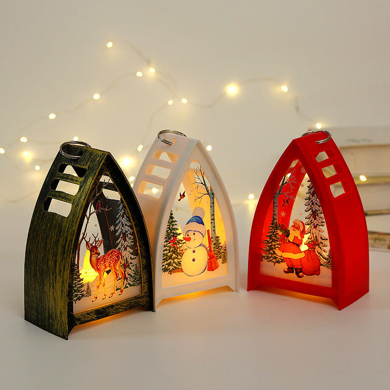 "Handmålat LED juldekorationsljus med snögubbe design för julbord, ger magisk och festlig stämning i hemmet."