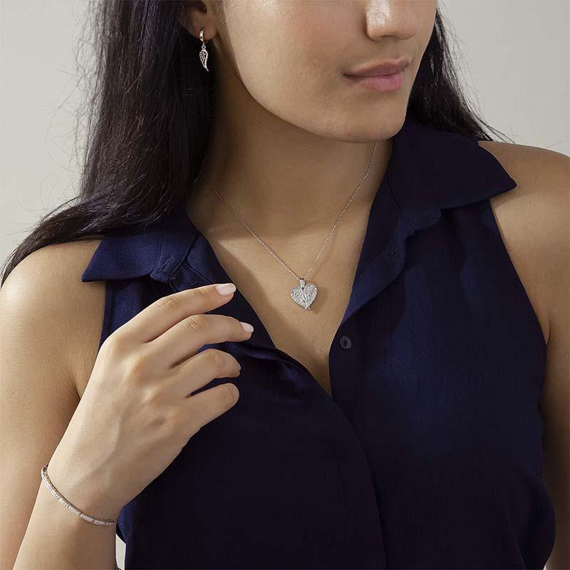 "Hängande halsband med hjärta och änglavingar, silverglänsande, smycket för damer, symbol för skydd och hopp."