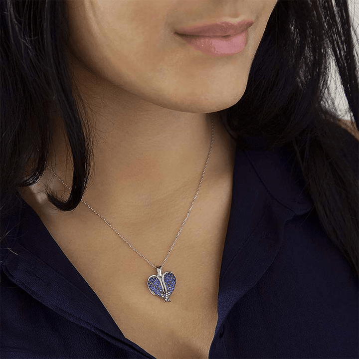 "Hängande halsband med hjärta och änglavingar, silverglänsande, smycket för damer, symbol för skydd och hopp."