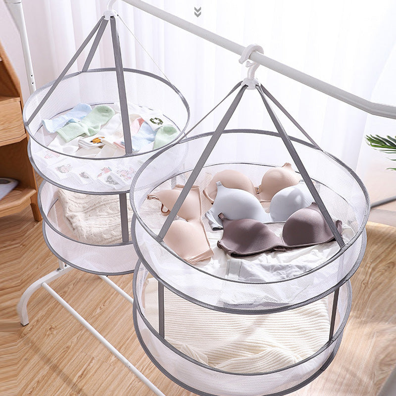 Hängande vit kläderkorg, rund form, stark och stor kapacitet, vindtät, perfekt för klädförvaring och torkning hemma.