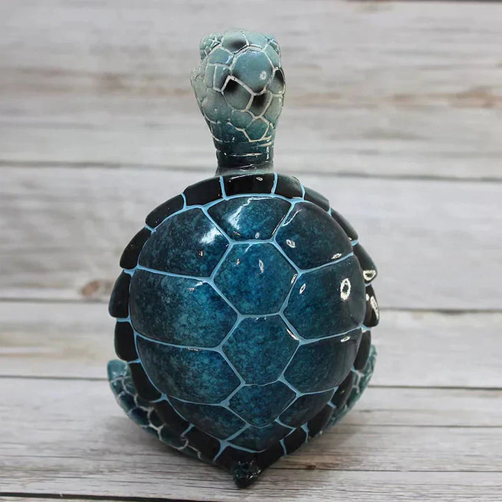 "Harmonisk meditations-skulptur, havssköldpadda i resin, idealisk för inredning, symboliserar zen och tålamod."