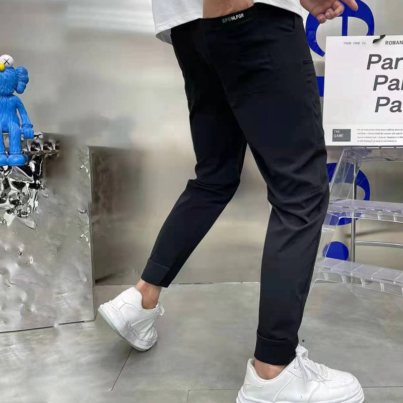 "Herr Cargo-byxor i högstretch, framifrån, gråa med flera fickor, perfekt för urban stil, komfort och vinterbruk."
