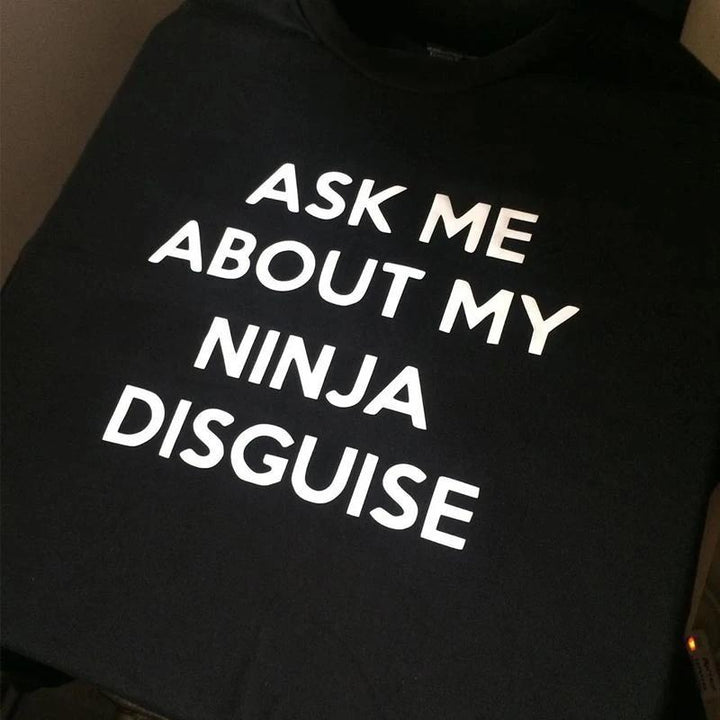 "Herr Festlig Ninja T-shirt, svart/grå bomull, med ninja-tema, perfekt för stil och lekfullhet, hög bekvämlighet."