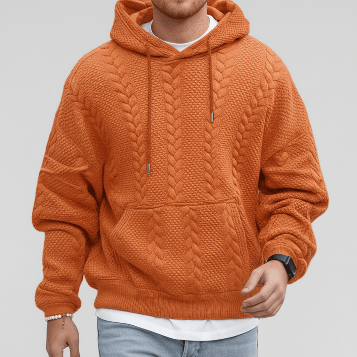 Gör ett intryck med herr Logan flätstickad huvtröja. Stilfull och bekväm modefavorit för män.