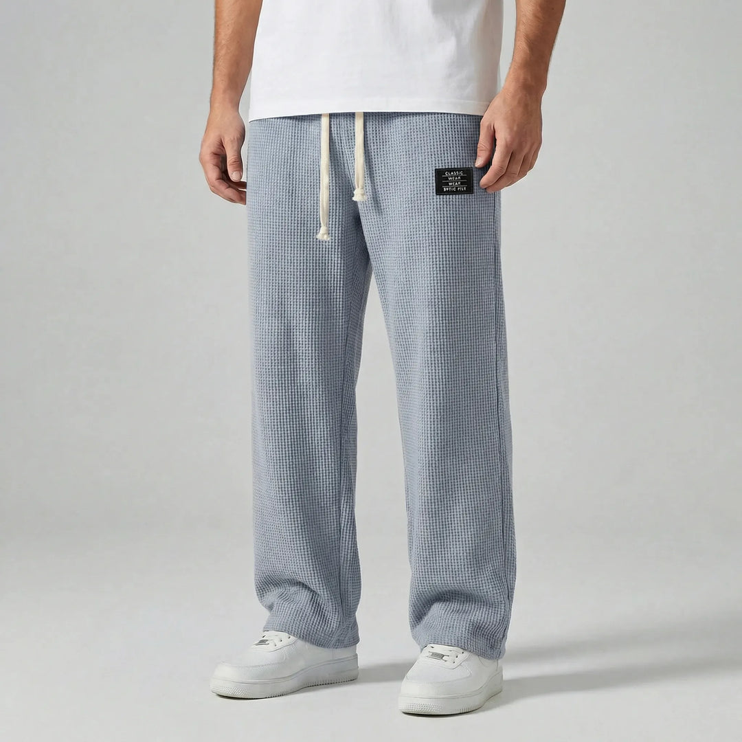 Bekväma herrbyxor Toby: Mörkgrå sweatpants med dragsko, perfekta för vardagsbruk och ledig stil.