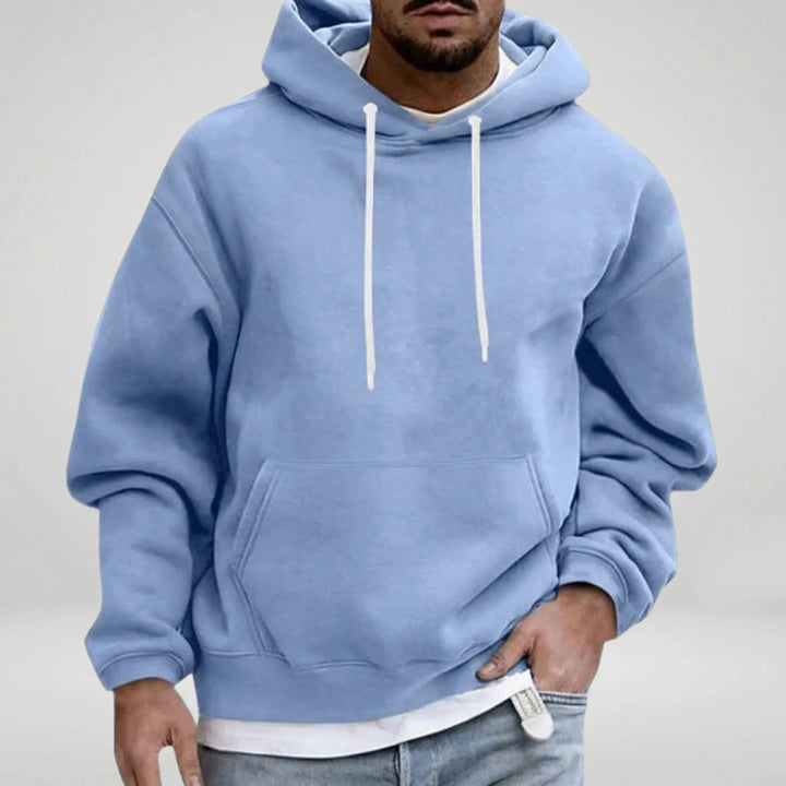 Sportig men avslappnad herrtröja, perfekt lagerplagg. Mångsidig för träning eller casual look.