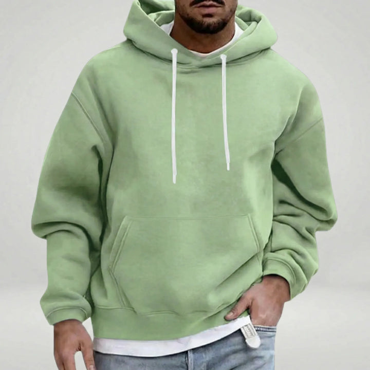 Herr pullover-huvtröja med långa ärmar och ribbade muddar. Avslappnad passform för en modern stil.