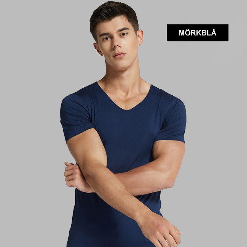 "Herr Ice Silk sport T-shirt i slimmad passform, snabbtorkande och andningsbar med UPF 50+ skydd och rund hals."