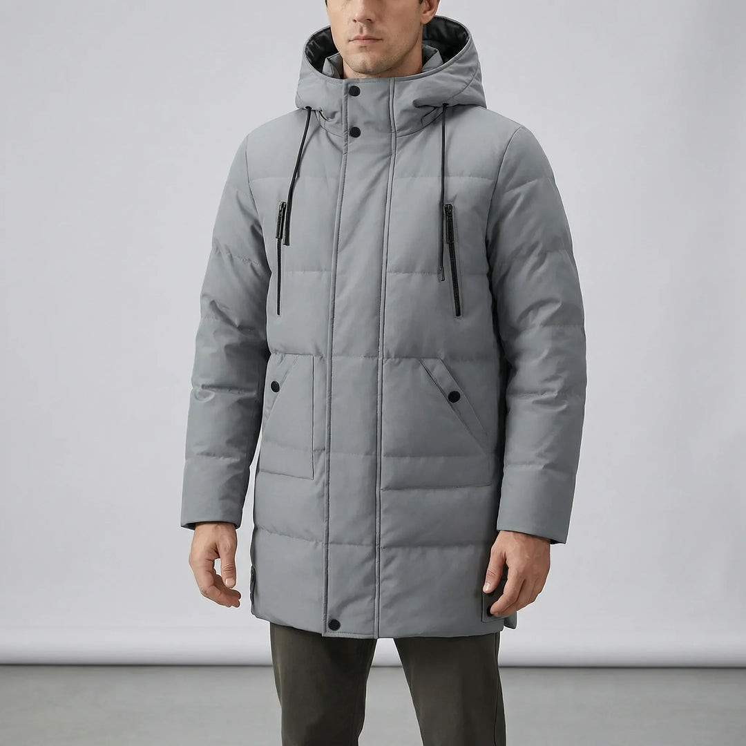 Herr isolerad parkas, en varm vinterjacka med huva som ger gott skydd mot kyla och vind.