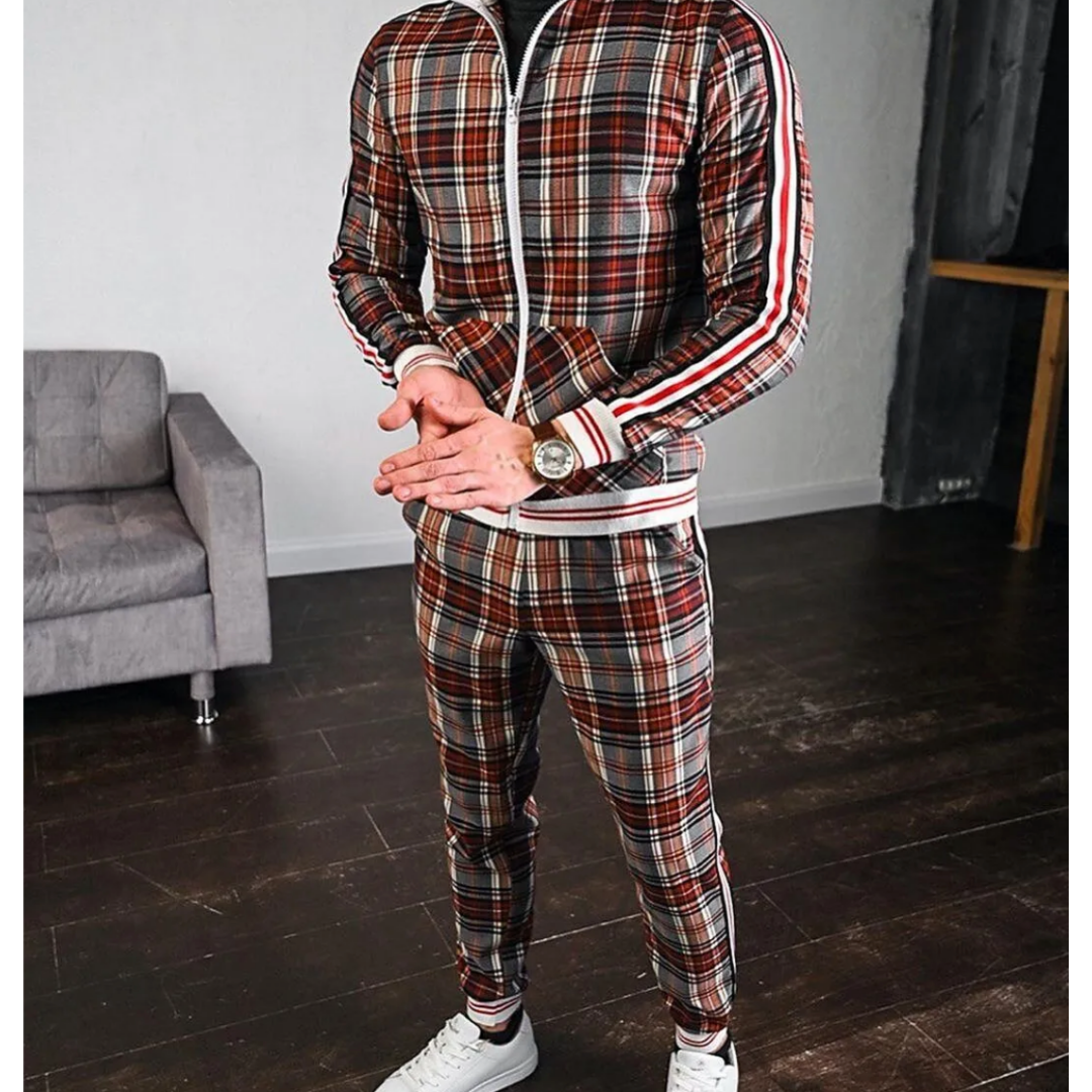 Helfigur vy av man som bär den rutiga herr joggingoverallen, visar aktiv och modern stil.