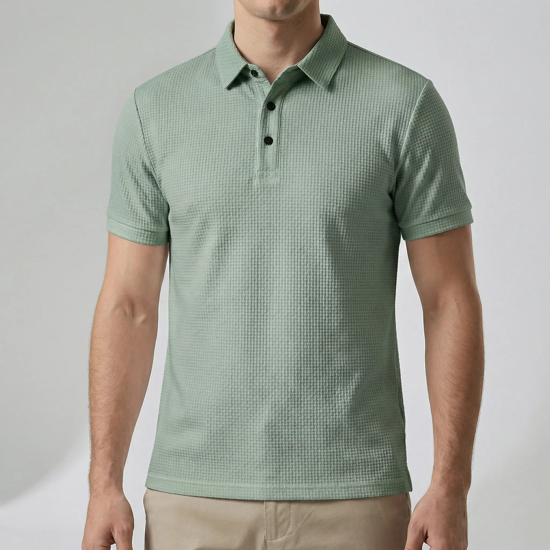 Kortärmad pikétröja för herrar, en bekväm och modern del av business casual-garderoben.