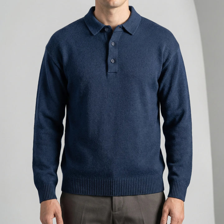 Svart, stilren herr polotröja med lång ärm. Mjukt tyg för komfortabelt herrmode.