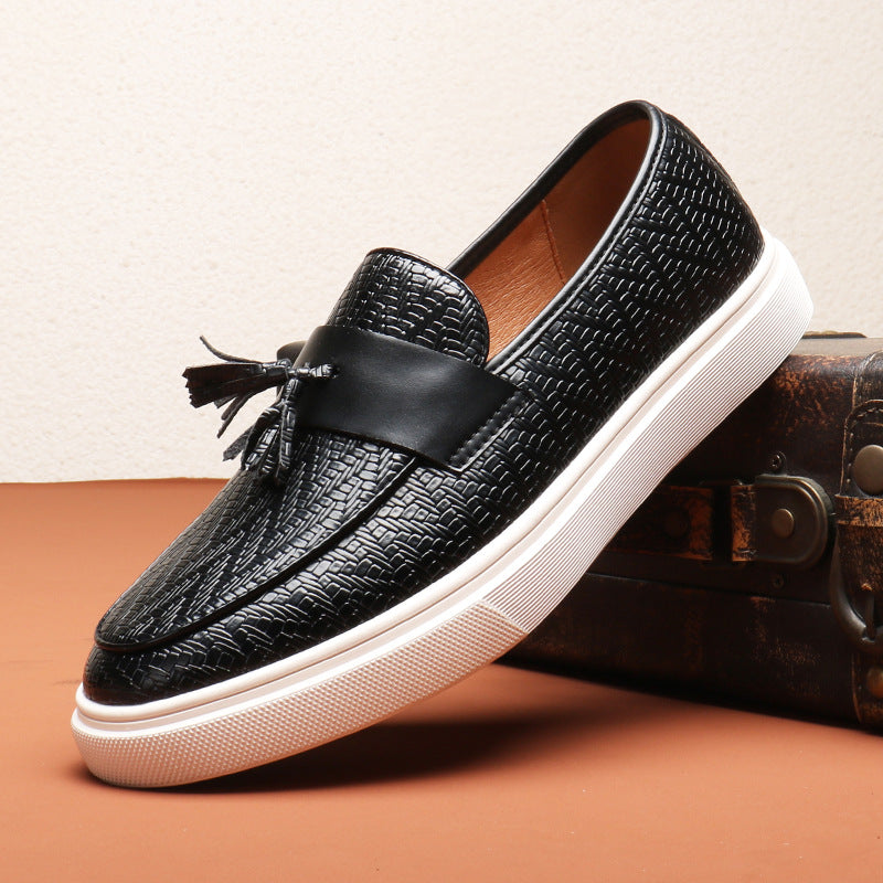 Svarta herr loafers med dubbla tofsar, bekväma slip-on skor för en sofistikerad look.