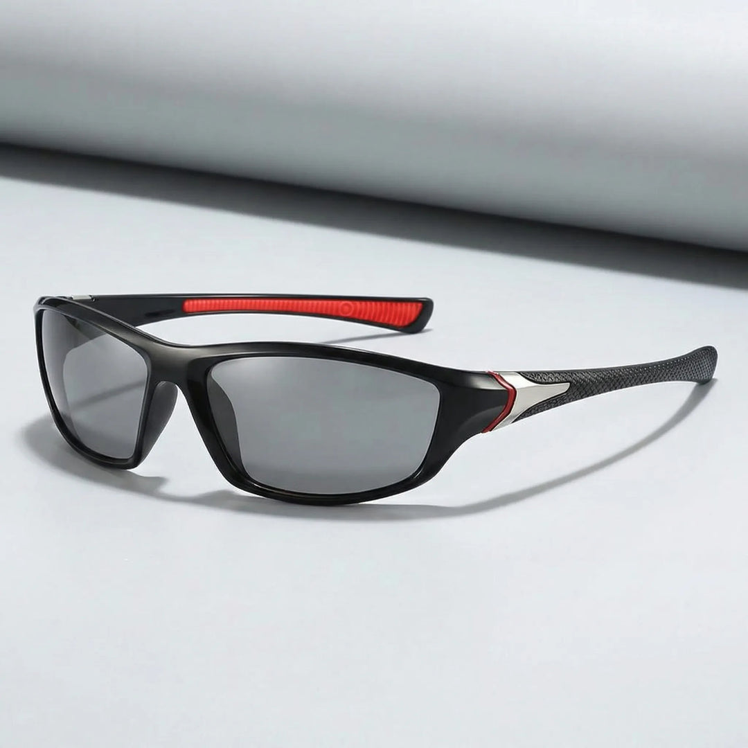 Herrsolglasögon Owen med blå spegelglas, svarta bågar. Optimala för sport & utomhus, ger UV-skydd. Lättviktsdesign.