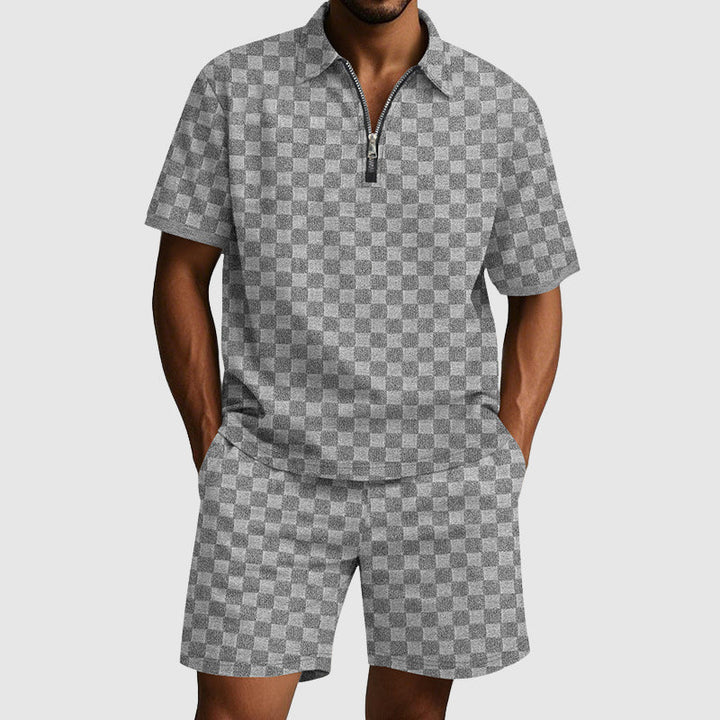Pikétröja och shorts set för män i marinblått, idealiskt för fritidsbruk