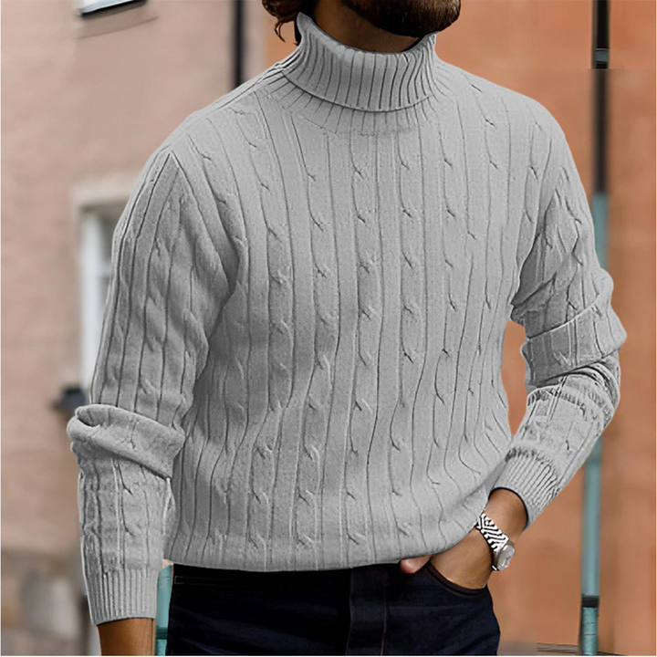 Stickad herrpolotröja. Varmt och elegant basplagg för en klassisk look under kalla dagar.