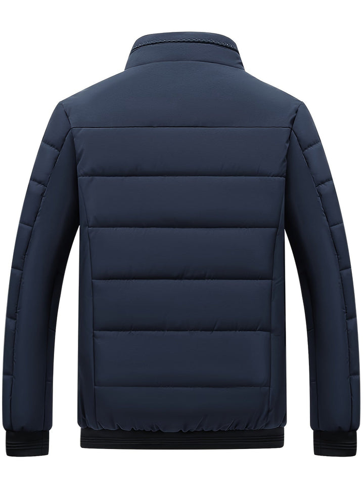 Mångsidig höstjacka: Joseph quiltad herrjacka. Vadderad och varm för både höst och mild vinter, elegant design.